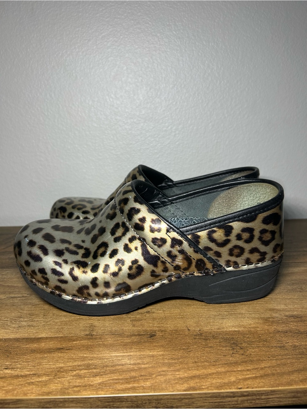 Dansko Leopard Print Slip-On Clogs in Gold and Black
